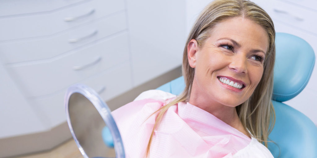 female patient smiling after procedure