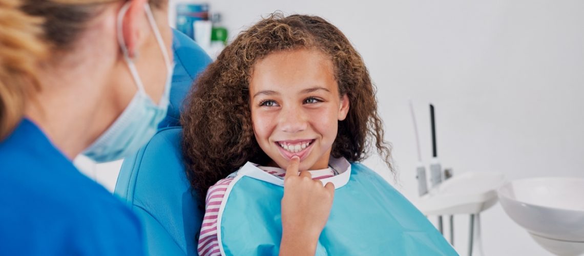 Oral surgeon discussing bone graft procedure with patient