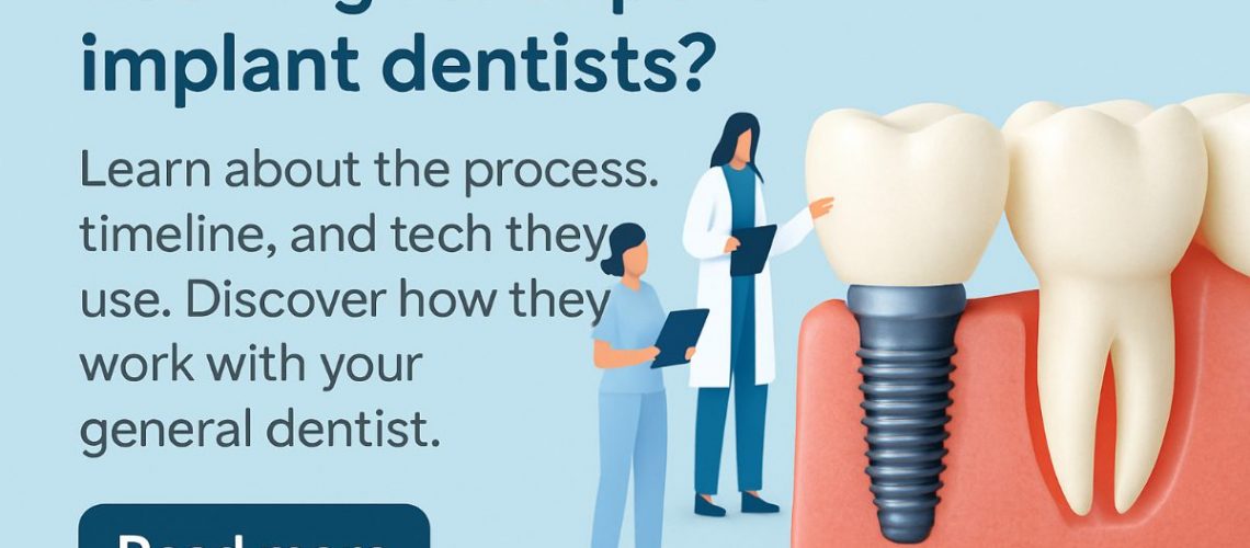 An oral and maxillofacial surgeon standing next to a chairside dental assistant, both wearing surgical scrubs and masks, consulting over digital 3D X-ray images of a patient's mouth on a computer screen. No text on the image.